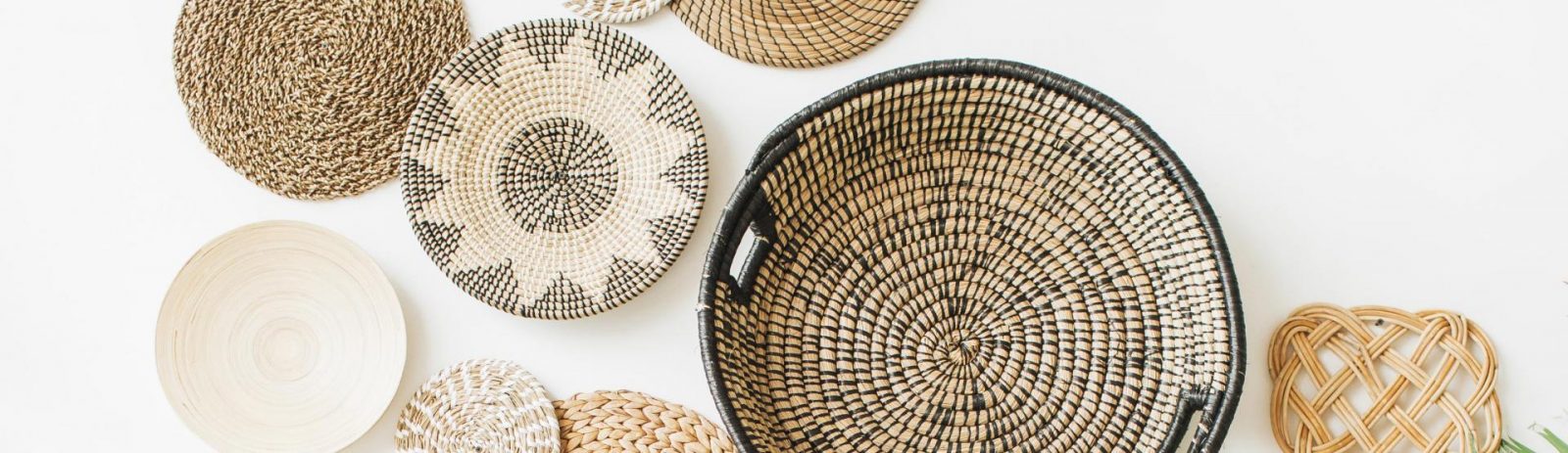 Thrift for gifts this holiday season like pretty baskets to hang on the wall.